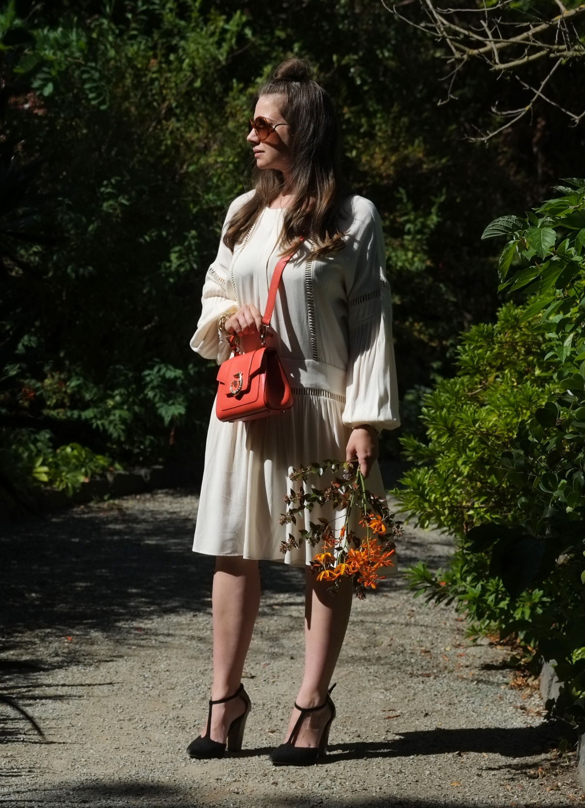 Lady Melbourne wearing MESOP dress with Trussardi Bag