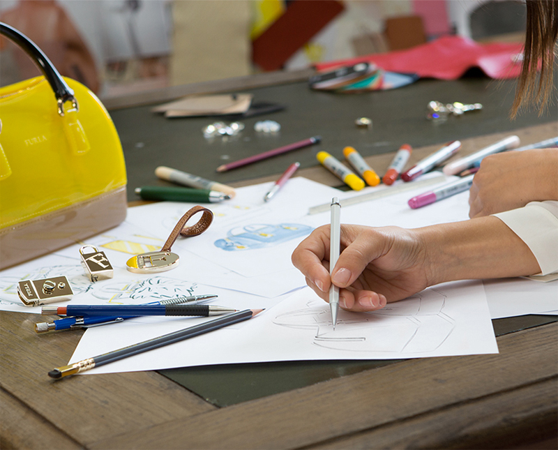 A Furla artisan at work in Bologna