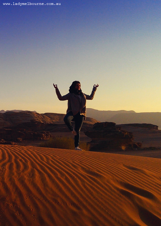 Doing yoga in Wadi Rum, Jordan