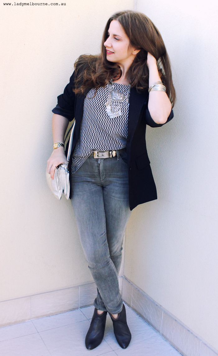 Chic navy blazer with silver accessories