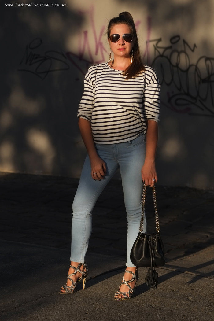 Lady Melbourne in skinny jeans and a breton top